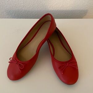 red ballet flats